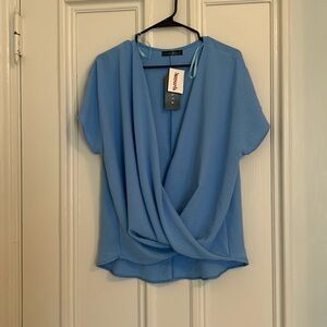 21 saints short sleeve light blue shirt